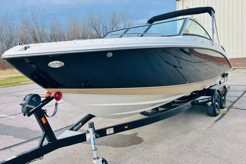 The Image of 2019 Bryant POTENZA 270 boat on trailer outdoors. - 0