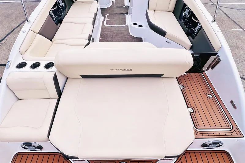 Slide: The Image of 2019 Bryant Potenza boat interior with luxurious seating and wood accents. - 14