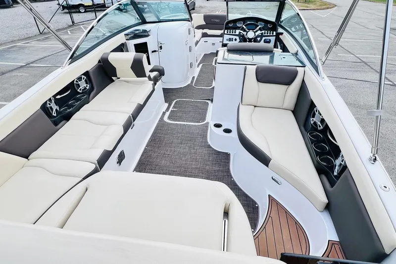 Slide: The Image of Luxurious 2019 Bryant Potenza boat interior with plush seating and modern dashboard. - 17