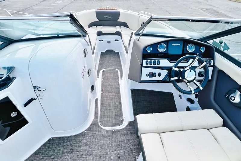 Slide: The Image of 2019 Bryant Potenza boat interior with modern dashboard and steering wheel. - 19