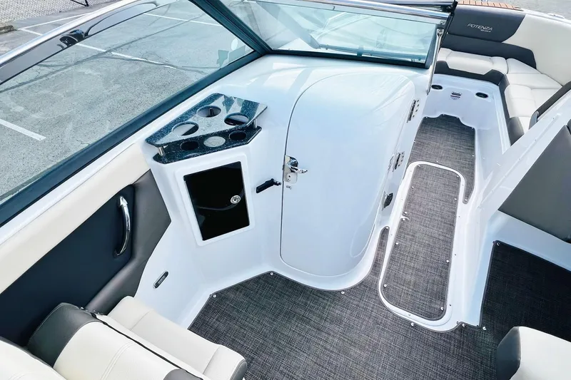 Slide: The Image of 2019 Bryant Potenza boat interior with seating and cup holders. - 32
