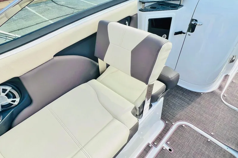 Slide: The Image of 2019 Bryant Potenza boat interior with cushioned seating and speaker system. - 34
