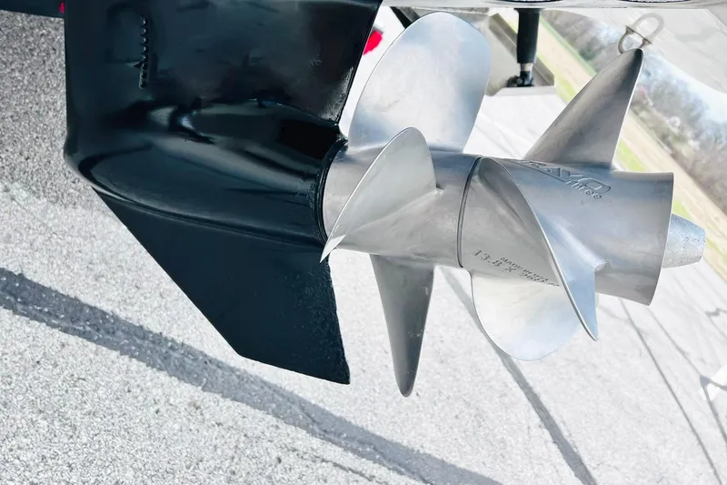 Slide: The Image of Close-up of a 2019 Bryant POTENZA 270 boat propeller on pavement. - 60