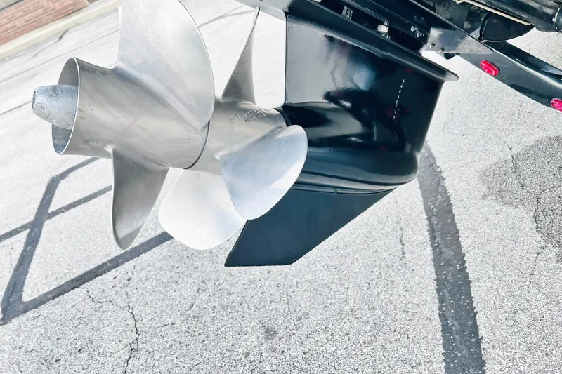 Slide: The Image of Close-up of a 2019 Bryant POTENZA 270 boat propeller on pavement. - 61