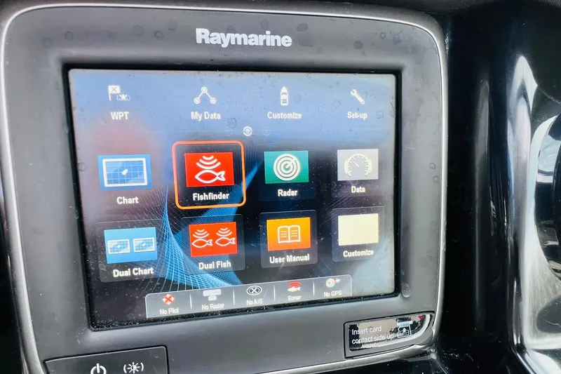 Slide: The Image of Raymarine display on 2019 Bryant POTENZA 270, featuring fishfinder and navigation options. - 67