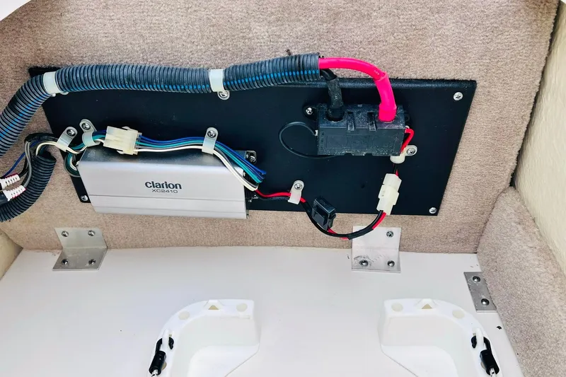 Slide: The Image of Electrical wiring and components inside a 2019 Bryant POTENZA 270 boat. - 77