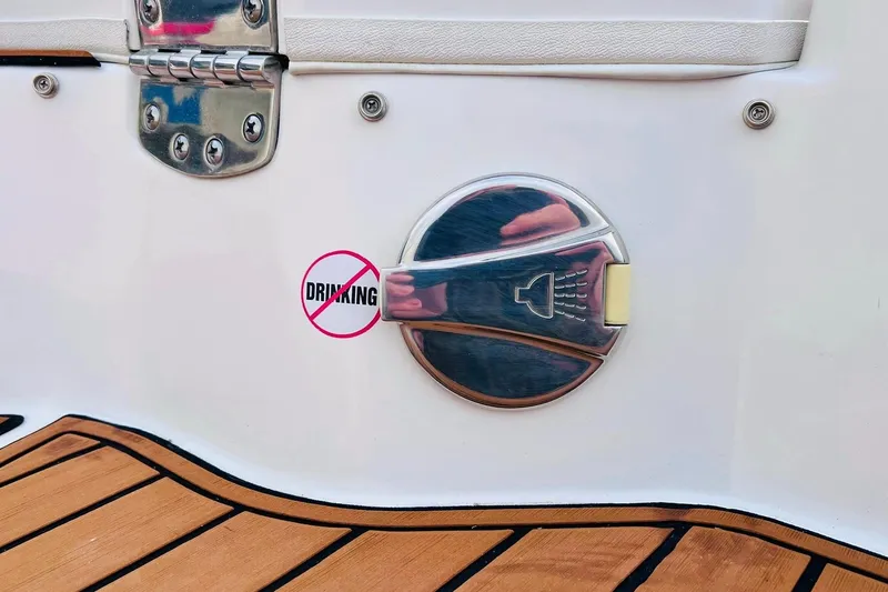 Slide: The Image of 2019 Bryant POTENZA 270 boat with "No Drinking" sign near shower outlet. - 81
