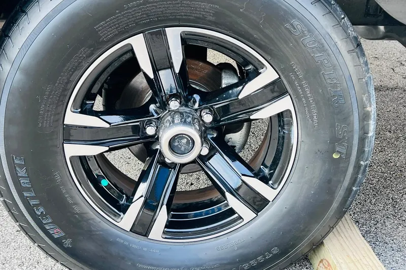 Slide: The Image of Close-up of a 2019 Bryant POTENZA 270 wheel with Westlake tire on asphalt. - 87