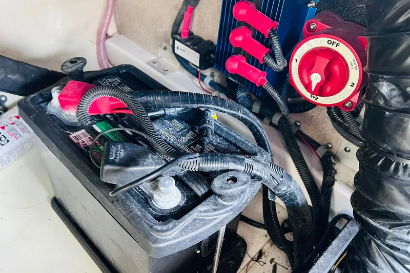 Slide: The Image of Battery and wiring setup in a 2019 Bryant POTENZA 270 boat. - 90