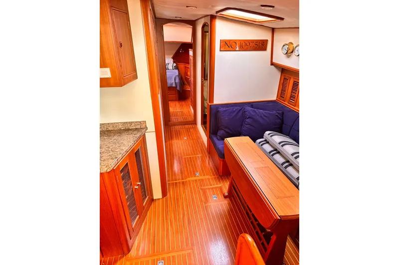 Slide: The Image of Bathroom interior of 2000 Grand Banks East Bay 49 yacht with granite countertop. - 18