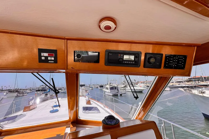 Slide: The Image of Interior view of 2000 Grand Banks East Bay 49 yacht cockpit with navigation instruments. - 2