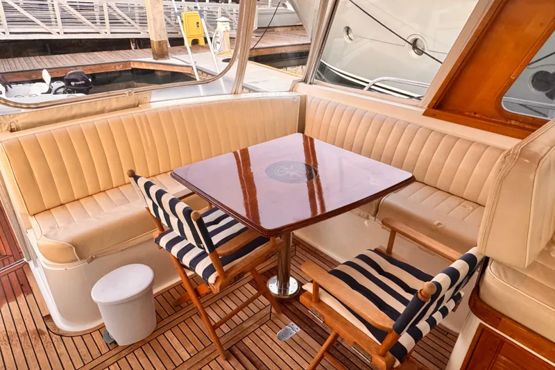 Slide: The Image of Interior view of 2000 Grand Banks East Bay 49 yacht overlooking the harbor. - 29