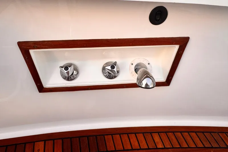 Slide: The Image of Interior of a 2000 Grand Banks East Bay 49 yacht overlooking the harbor. - 32