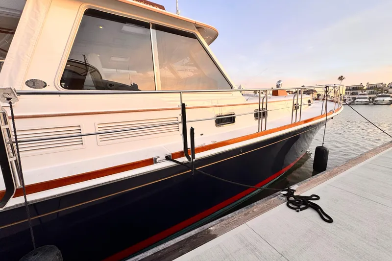 Slide: The Image of Interior of 2000 Grand Banks East Bay 49 yacht with wooden furnishings. - 35