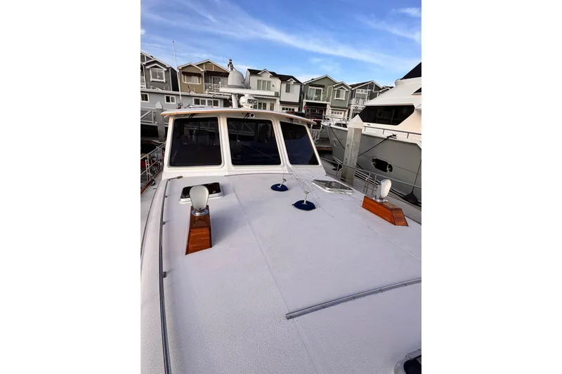 Slide: The Image of Interior of 2000 Grand Banks East Bay 49 yacht with elegant seating area. - 39