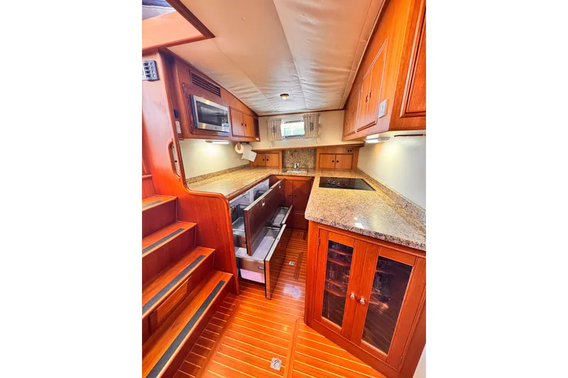 Slide: The Image of Interior view of Grand Banks East Bay 49 yacht kitchen, year 2000. - 57