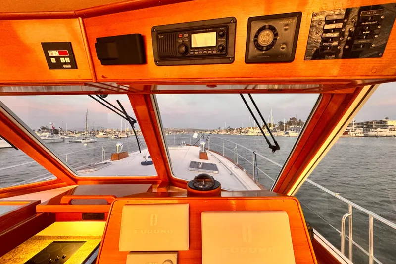 Slide: The Image of Interior view of 2000 Grand Banks East Bay 49 yacht overlooking the harbor. - 19