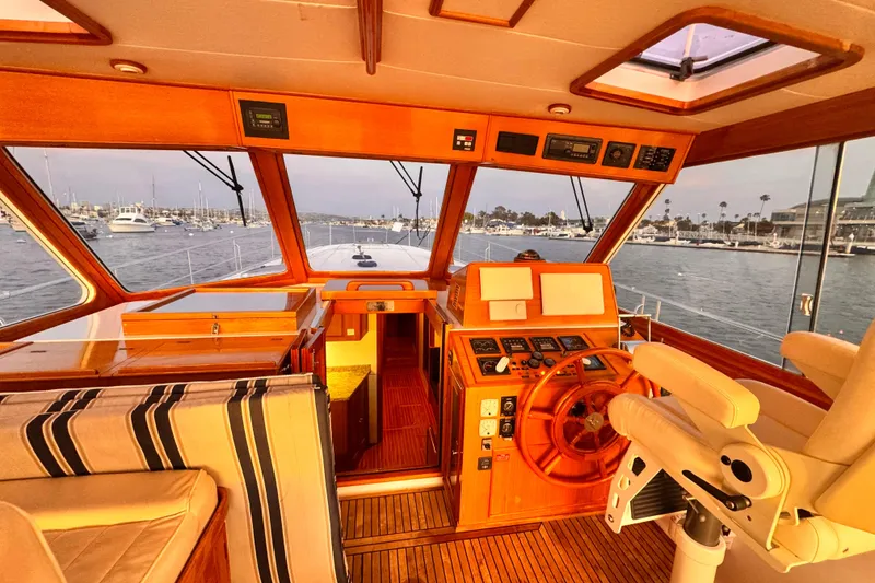 Slide: The Image of Interior of a 2000 Grand Banks East Bay 49 yacht overlooking the harbor. - 22