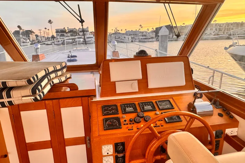 Slide: The Image of Helm of 2000 Grand Banks East Bay 49 at sunset. - 24