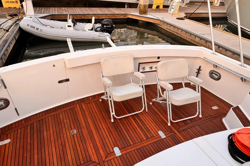 Slide: The Image of Grand Banks East Bay 49 yacht with teak deck and chairs, year 2000. - 33