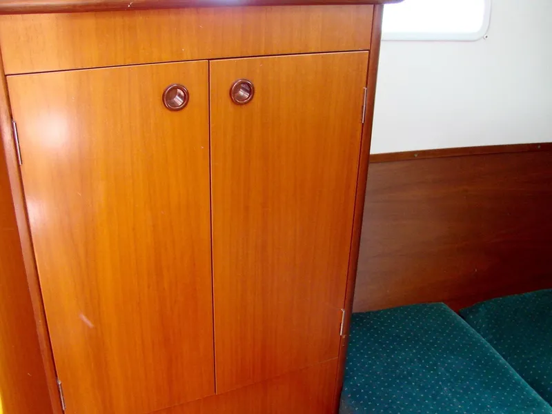 Slide: The Image of Interior of a 2001 Beneteau 331 yacht with wooden furnishings. - 17