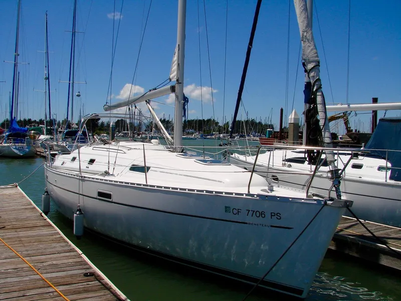 Slide: The Image of 2001 Beneteau 331 sailboat docked in marina. - 2