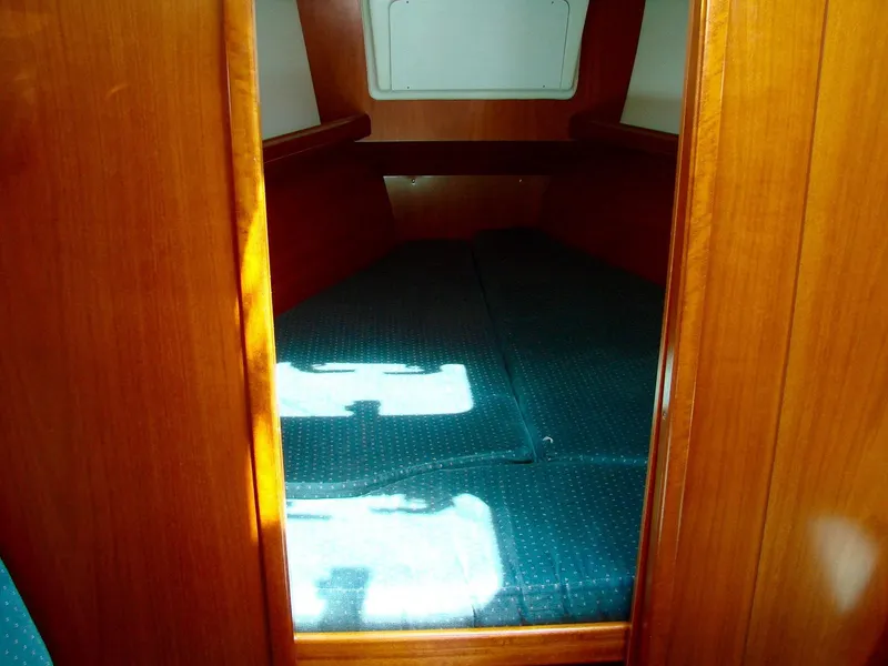 Slide: The Image of Interior of a 2001 Beneteau 331 yacht cabin. - 21