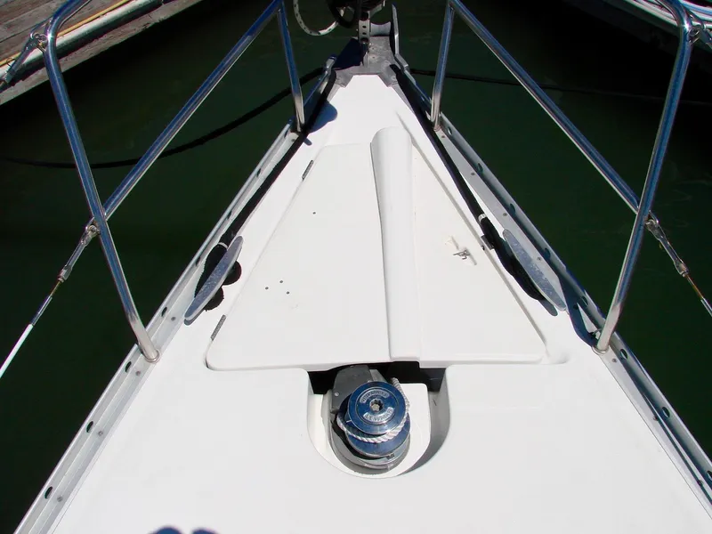 Slide: The Image of Deck of a 2001 Beneteau 331 sailboat at dock. - 6