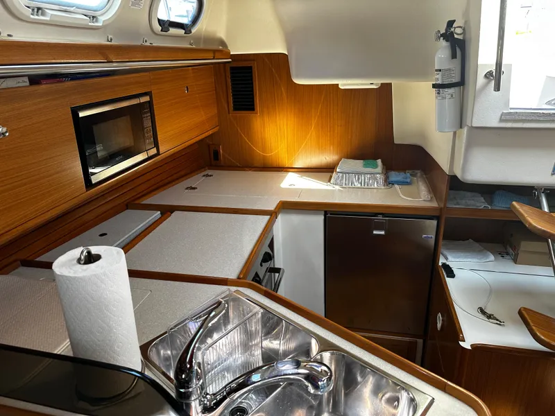 Slide: The Image of Interior of Catalina 385 yacht kitchen, 2017 model. - 13