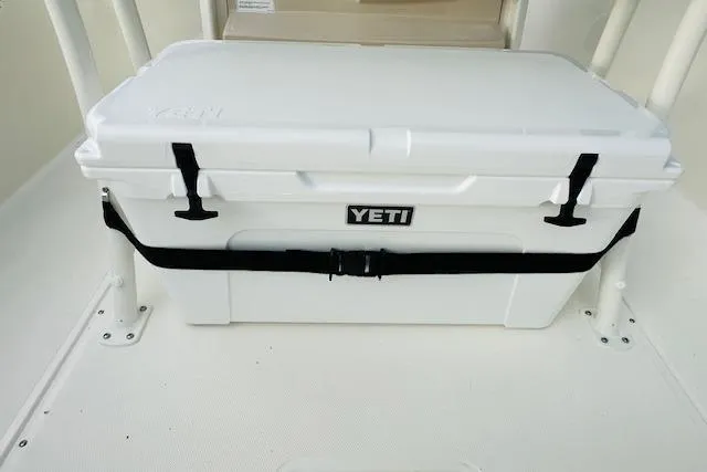 Slide: The Image of YETI cooler secured on 2025 Boston Whaler 250 Dauntless boat deck. - 11