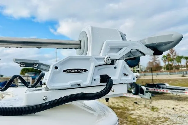 Slide: The Image of 2025 Boston Whaler 250 Dauntless with Power-Pole anchor system, close-up view. - 7