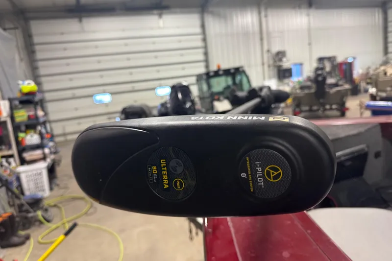 Slide: The Image of Minn Kota Ulterra motor on 2014 Tracker Targa V-18 Combo in a garage setting. - 16