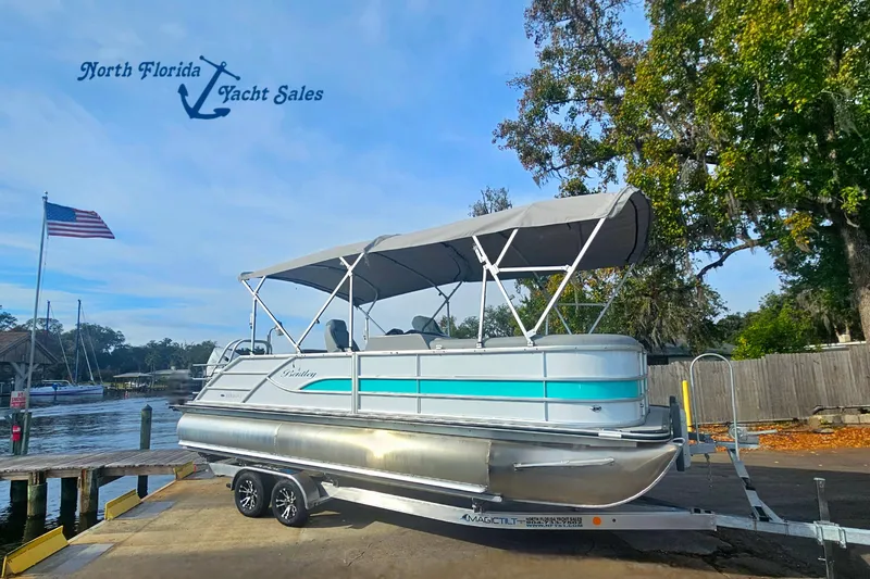 The Image of 2026 Bentley Pontoons Legacy 223 Swingback at North Florida Yacht Sales dock. - 0