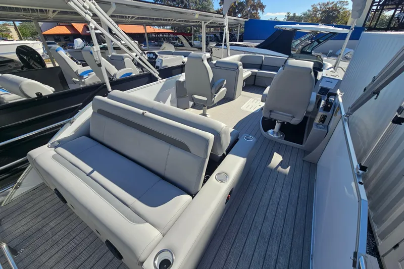 Slide: The Image of 2026 Bentley Pontoons Legacy 223 Swingback interior with luxurious seating and modern design. - 22