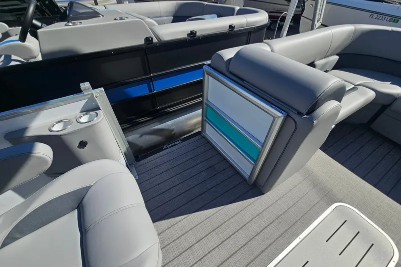 Slide: The Image of 2026 Bentley Pontoons Legacy 223 Swingback interior with gray seating and modern design. - 23
