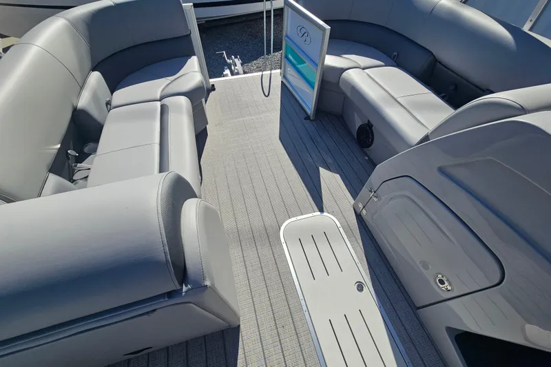 Slide: The Image of 2026 Bentley Pontoons Legacy 223 Swingback interior with luxurious gray seating and spacious layout. - 24