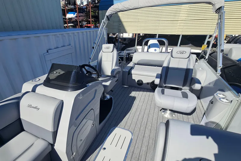 Slide: The Image of 2026 Bentley Pontoons Legacy 223 Swingback interior with luxurious seating and modern design. - 8