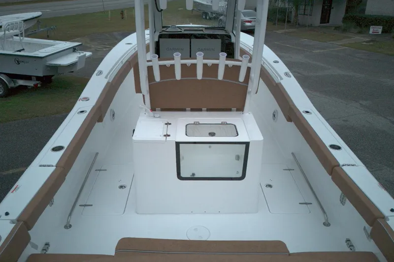 Slide: The Image of 2026 Sea Hunt Ultra 285 Coffin Box boat interior with seating and storage. - 12