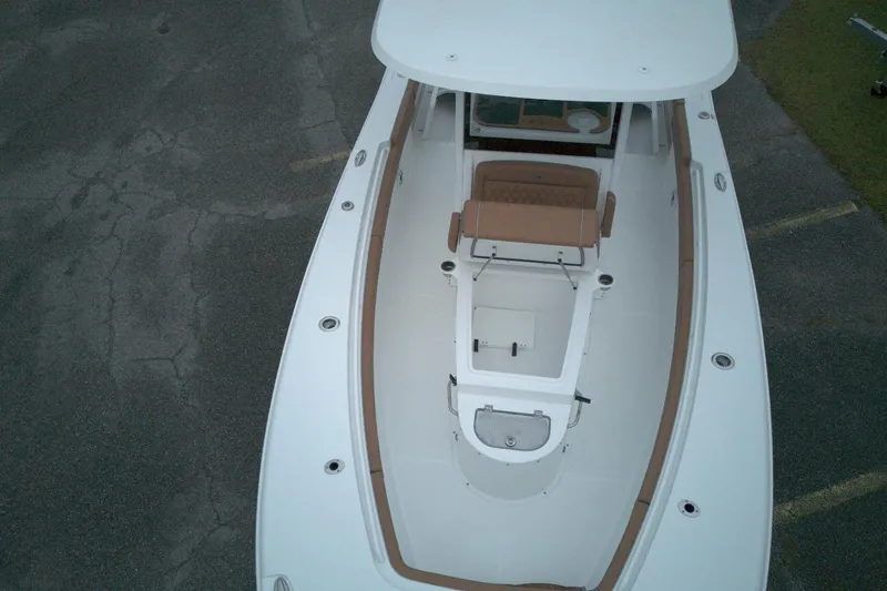 Slide: The Image of Top view of 2026 Sea Hunt Ultra 285 Coffin Box boat, featuring spacious deck layout. - 5