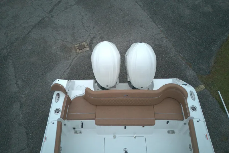 Slide: The Image of Top view of 2026 Sea Hunt Ultra 285 Coffin Box boat with twin engines. - 9