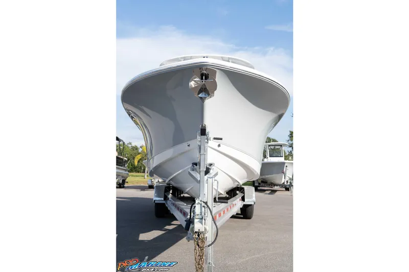 Slide: The Image of 2026 Sea Hunt Gamefish 30 Coffin Box boat on trailer, front view. - 19