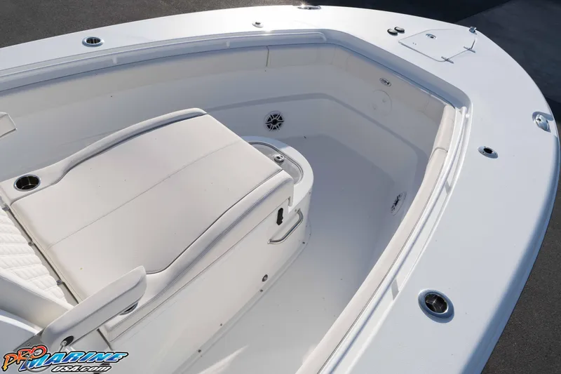 Slide: The Image of 2026 Sea Hunt Gamefish 30 Coffin Box boat interior with seating and cup holders. - 38