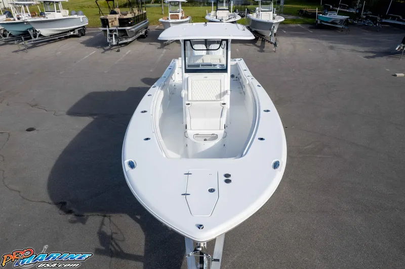 Slide: The Image of 2026 Sea Hunt Gamefish 30 Coffin Box boat in a marina setting. - 5