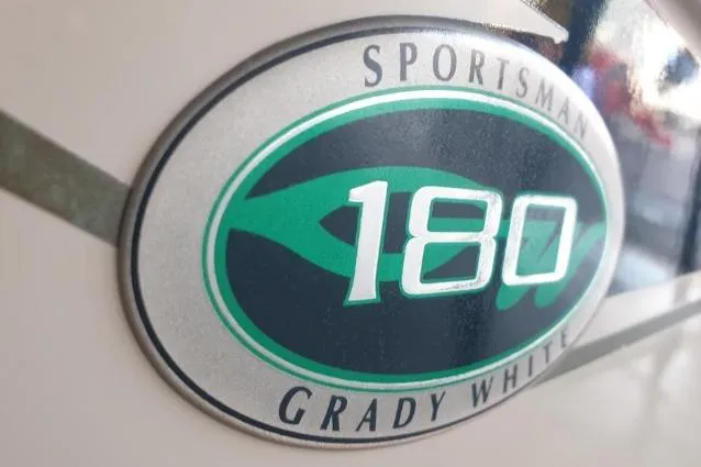 Slide: The Image of 2008 Grady White 180 Sportsman logo on boat exterior. - 10