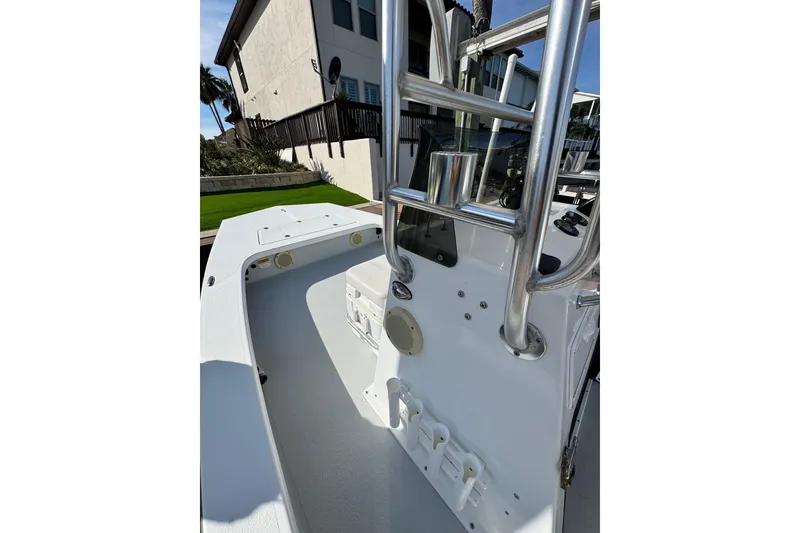 Slide: The Image of 2012 Majek Illusion 226 boat interior with stainless steel railings and control panel. - 18