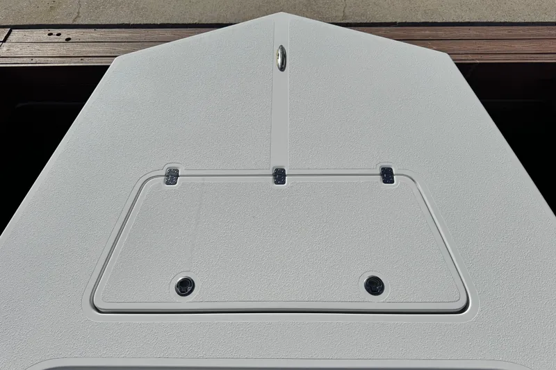 Slide: The Image of 2012 Majek Illusion 226 boat deck with storage hatch and textured surface. - 19