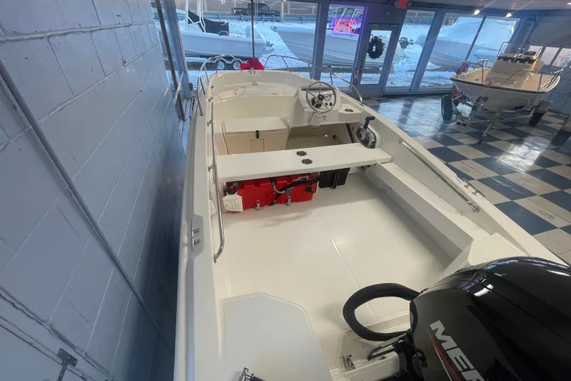 Slide: The Image of Interior view of 2026 Boston Whaler 160 Super Sport boat. - 11