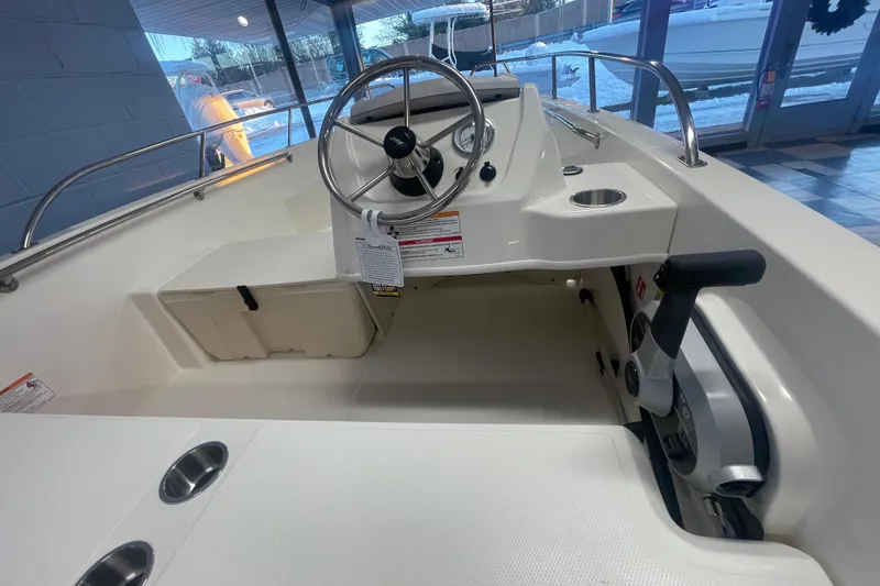 Slide: The Image of Interior view of 2026 Boston Whaler 160 Super Sport boat. - 5