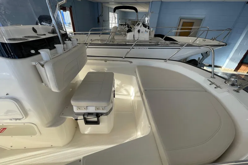 Slide: The Image of Interior view of the 2026 Boston Whaler 150 Montauk boat. - 10