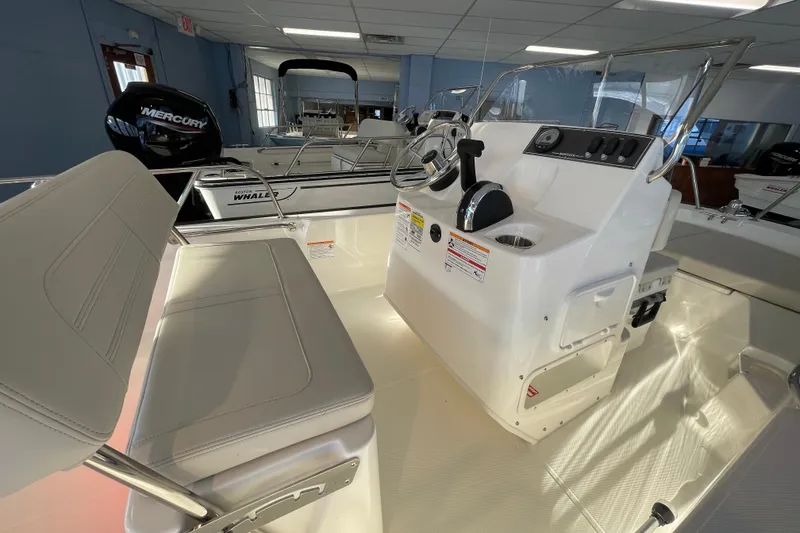 Slide: The Image of Interior view of the 2026 Boston Whaler 150 Montauk boat. - 9